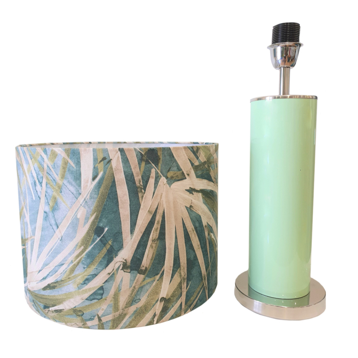 Table lamp with cylindrical base in green glass and cylindrical lamp shade with abstract pattern in shades of green and bege