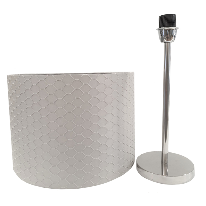 Table lamp with grey base and grey cylindrical lamp shade with relief