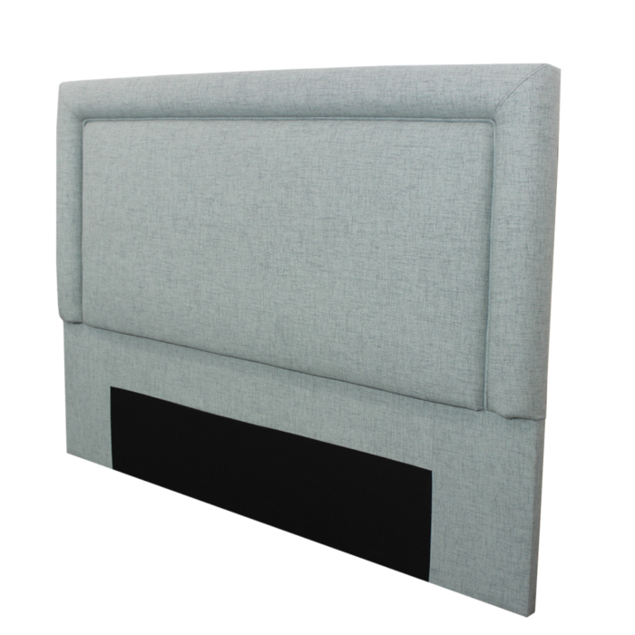 Upholstered headboard with aqua green fabric