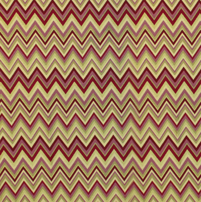 Decorative fabric patterned with zigzag in red and yellow tones