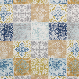 Tecido decorativo e para estofo ligeiro com padrão a fazer lembrar azulejos em tons de amarelo, dourado, azul escuro e claro