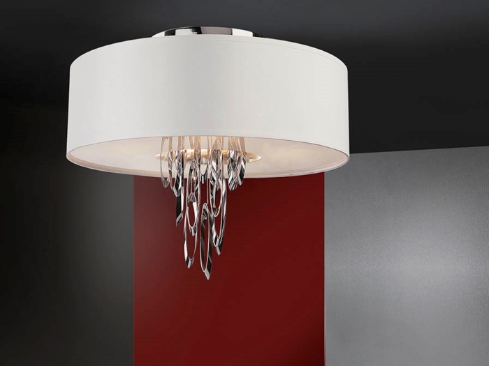 White cylindrical ceiling lamp with metallic wires suspended inside
