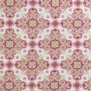 Decorative fabric and for soft upholstery with a pattern reminiscent of tiles in shades of pink, yellow and green