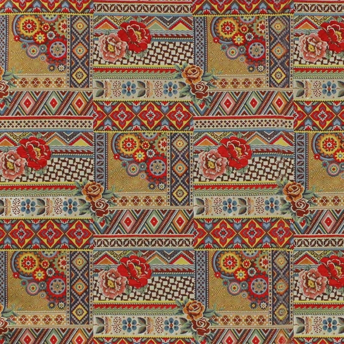 Yellow decorative fabric in shades of red and toasted yellow
